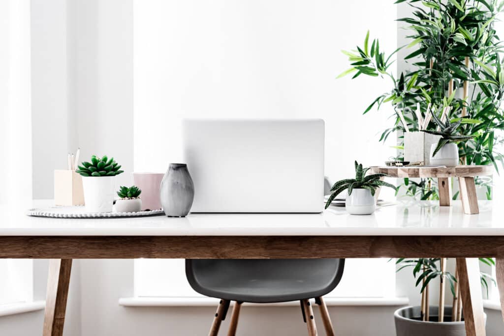 laptop on desk. Best Weekly Pay Jobs